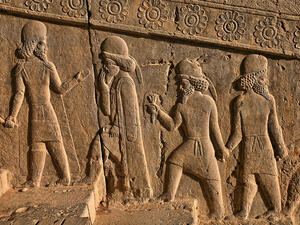 A stone chip of guests who have come to congratulate the Achaemenid king. (Shutterstock/ File Photo)