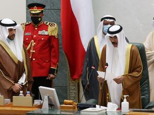 Sheikh Nawaf al-Ahmad Al-Sabah (2-R) reads a statement asfter being sworn in as Kuwait's new Emir at the National Assembly in Kuwait City, as Parilament Speaker Marzouq al-Ghanem (L) looks on, on September 30, 2020. Kuwait today swore in its new emir, Sheikh Nawaf al-Ahmad Al-Sabah, after the death of his half-brother, Sheikh Sabah, who died in the US at the age of 91. Yasser Al-Zayyat / AFP