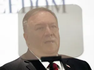 US Secretary of State Mike Pompeo is pictured through a teleprompter as he delivers remarks at a Holy See Symposium on Advancing and Defending Religious Freedom through Diplomacy on September 30, 2020 in Rome. US Secretary of State Mike Pompeo renewed an appeal on September 30, 2020 for the Vatican to take a stand against China, pushing a religious freedom theme used in President Donald Trump's re-election campaign. GUGLIELMO MANGIAPANE / POOL / AFP