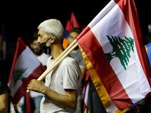 Lebanese of Armenian origin raise Armenian, national and Nagorno-Karabakh flags as they take part in a rally organised by the Tashnak party, in support of the Armenians of Nagorno-Karabakh, in the capital Beirut's eastern suburban neighbourhood of Bourj Hamoud, on October 9, 2020. Armenia and Azerbaijan have for decades been locked in a conflict over Nagorno-Karabakh, an ethnically Armenian area which broke away from Baku in a 1990s war that cost about 30,000 lives. Heavy fighting erupted on September 27 in