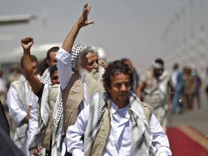 Freed Yemeni prisoners arrive in the rebel-held capital Sanaa, on October 16, 2020, as the war-torn country began swapping 1,000 prisoners in a complex operation overseen by the International Committee of the Red Cross. Mohammed HUWAIS / AFP