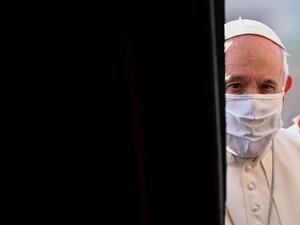 Pope Francis, wearing a protective face mask, arrives for an inter-religious prayer service for peace along with other religious representatives in the Basilica of Santa Maria in Aracoeli, a church on top of Rome's Capitoline Hill, on October 20, 2020 in Rome. Andreas SOLARO / AFP