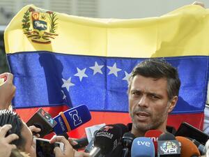 In this file photo taken on May 02, 2019, Venezuelan high-profile opposition politician Leopoldo Lopez speaks outside the Spanish embassy in Caracas, where he sought refuge since claiming to have been freed from house arrest two days ago by rebel military personnel. Juan BARRETO / AFP