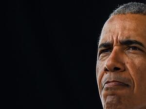 Former US President Barack Obama speaks at a Biden-Harris drive-in rally in Miami, Florida on October 24, 2020. CHANDAN KHANNA / AFP