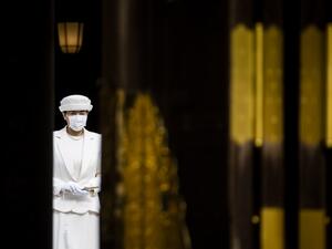 Japan's Empress Masako wearing a face mask leaves the main shrine after paying a tribute during a ceremony to mark 100 years since the founding of Meiji shrine in Tokyo on October 28, 2020. Behrouz MEHRI / AFP