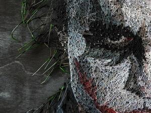 Konstantin says that unlike other artists he knows, he doesn't create with works using a plan, instead using the thread as a pencil and drawing his creations as he weaves it round the various nails. Pictured, Heath Ledger as the Joker (Instagram)