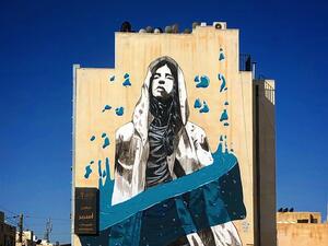 By Suhaib Attar, Girl in blue. Part of @baladk project 2020 session mural is about waste control and to keep our water and sea clean (Instagram)