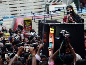 M.K. Kanimozhi, a Member of Parliament and Dravida Munnetra Kazhagam (DMK) women's wing Chief speaks during a protest march to condemn the alleged gang-rape and murder of the 19-year-old in Bool Garhi village of Uttar Pradesh state (AFP)