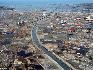 The number of natural disasters around the world has doubled since the turn of the century. Pictured: the after-effects of the tsunami in Indonesia on Boxing Day, 2004./ (AFP/File)