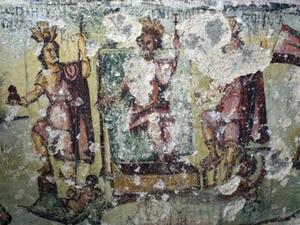 Depicted at the centre of the west wall of the Bait Ras Tomb: Enthroned, Zeus Kapitolios (centre), after whom the city of Capitolias (Bait Ras) was named (Photo courtesy of CNRS)