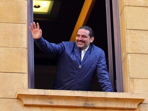 Lebanese Former Prime Minister Saad Al Hariri greets his supporters upon his arrival at his home in Beirut on Wednesday (AFP photo)
