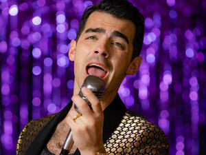 His pink avatar is only the latest in a line of hair color changes