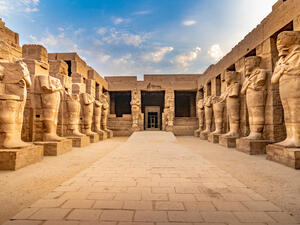 Large sculptures of pharaohs inside beautiful Egyptian landmark with hieroglyphics, and ancient symbols.  (Shutterstock/ File Photo)