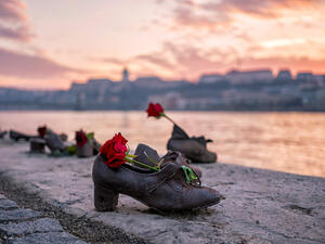 "Shoes on the Danube bank" - Monument as a memorial of the victims of the Holocaust during WWII on the bank of the Danube at sunset in Budapest, Hungary  (Shutterstock)	  