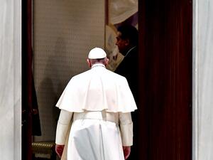 Pope Francis leaves at the end of weekly general audience in the Paul VI hall at the Vatican, on October 28, 2020. Tiziana FABI / AFP