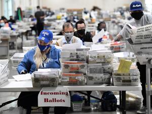 Mail-in ballots for the US presidential election are sorted at the Los Angeles County Registrar Recorders' mail-in ballot processing center at the Pomona Fairplex in Pomona, California, October 28, 2020. Robyn Beck / AFP