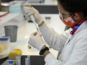 In this file photo taken on August 14, 2020 a scientist works at the mAbxience biosimilar monoclonal antibody laboratory plant in Garin, Buenos Aires province, where an experimental coronavirus vaccine will be produced for Latin America. (AFP)