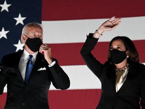 In this file photo taken on August 20, 2020 Former vice-president and Democratic presidential nominee Joe Biden (L) and Senator from California and Democratic vice presidential nominee Kamala Harris greet supporters outside the Chase Center in Wilmington, Delaware. Olivier DOULIERY / AFP