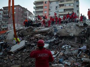  A powerful earthquake hit Turkey and Greece on October 30, killing at least six people, levelling buildings and creating a sea surge that flooded streets near the Turkish resort city of Izmir. Yasin AKGUL / AFP