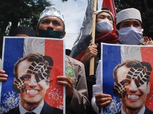 Muslim protesters gather to protest against French President Emmanuel Macron outside the French Institute in Bandung on November 2, 2020. Timur Matahari / AFP