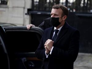 French President Emmanuel Macron greets Austrian ambassador Michael Linhart (not pictured) who has gone into self-isolation after coming into contact with a person who has tested positive for COVID-19, after signing a condolence book for victims of the Vienna attack in Paris, on November 3, 2020. Four persons are reported to have died and many are seriously injured in what officials treat as a terror attack which took place in the evening of November 2 in Vienna. Christophe PETIT TESSON / POOL / AFP