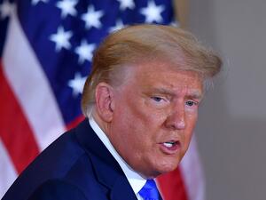 US President Donald Trump leaves after speaking during election night in the East Room of the White House in Washington, DC, early on November 4, 2020. MANDEL NGAN / AFP