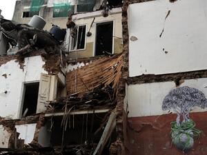 This picture shows a view of a building damaged by the August 4 port blast, in the Lebanese capital Beirut's Gemayzeh neighbourhood on November 5, 2020. Beirut's August 4 disaster, which authorities say was caused when a huge stockpile of ammonim nitrate fertiliser caught fire years after it was impounded at the port, killed more than 200 people and damaged or destroyed around 70,000 homes. The country's worst peace-time tragedy rendered entire districts unrecognisable. Now winter rains are adding to the de