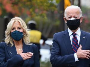 US President-elect Joe Biden and his wife Jill Biden pay their respects during a Veterans Day stop at the Korean War Memorial Park in Philadelphia, Pennsylvania on November 11, 2020. The leaders of close US allies on November 10, 2020 telephoned President-elect Joe Biden and pledged to work together but in an extraordinary break, America's top diplomat Mike Pompeo insisted that Donald Trump would remain in power. The transition team said Biden planned to work with the Europeans on fighting the Covid-19 pand