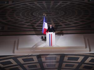 French President Emmanuel Macron delivers his speech by the coffin of late French author Maurice Genevoix who will be inducted to the Pantheon mausoleum where key figures from France's history are honoured, in Paris, on November 11, 2020, as part of the commemorations marking the 102nd anniversary of the November 11, 1918 Armistice, ending World War I (WWI). France on November 11 moves the remains of World War I writer Maurice Genevoix into its Pantheon of national heroes in Paris, an honour championed by t