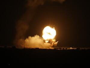 Flames are seen following an Israeli air strike in the town of Khan Yunis, in the southern Gaza Strip, early on November 22, 2020. AFP