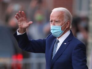 President-elect Joe Biden waves to supporters as he leaves the Queen theater after receiving a briefing from the transition COVID-19 advisory board on November 09, 2020 in Wilmington, Delaware. Mr. Biden addressed the media earlier in the day about his response to the COVID-19 pandemic. Joe Raedle/Getty Images/AFP JOE RAEDLE / GETTY IMAGES NORTH AMERICA / Getty Images via AFP