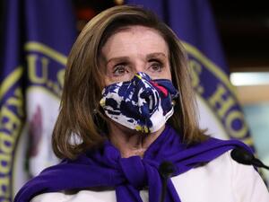  Speaker of the House Nancy Pelosi (D-CA) (C) talks to reporters after she was re-elected to lead her conference at the U.S. Capitol November 18, 2020 in Washington, DC. The conference leadership elections were conducted with some members in-person at a Washington hotel and others joining by Zoom due to the risk posed by the coronavirus pandemic. Chip Somodevilla/Getty Images/AFP CHIP SOMODEVILLA / GETTY IMAGES NORTH AMERICA / Getty Images via AFP