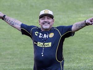 In this file photo taken on September 10, 2018 Argentine legend Diego Maradona gestures during his first training session as coach of Mexican football club Dorados, at the Banorte stadium in Culiacan, Sinaloa State, Mexico. (AFP/ Pedro Pardo)