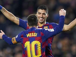 صورة أرشيفية لسواريز وميسي