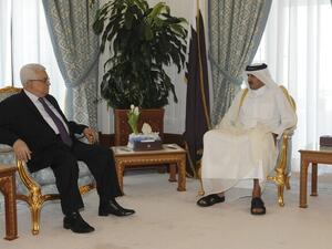 الرئيس الفلسطيني يلتقي أمير قطر في الدوحة