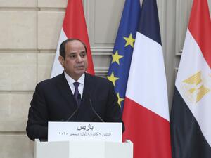 Egyptian President Abdel Fattah al-Sisi speaks during a press conference with French President following their meeting at the Elysee presidential Palace on December 7, 2020 in Paris, as part of al-Sisi's three-day controversial state visit to France, with activists warning Paris not to turn a blind eye to Cairo's rights record with a red carpet welcome. Michel Euler / POOL / AFP