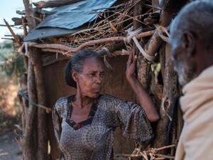 Jano Admasi, whose son was reportedly killed by the Ethiopian Defense Forces during the fightings that broke out in Ethiopia's Tigray region, poses with her husband at her house in the village of Bisober, on December 9, 2020. Tigrayan forces settled in the school several months ago. The November 14 killings represent just one incident of civilian suffering in Bisober, a farming village home to roughly 2,000 people in southern Tigray. In retrospect, Bisober residents say, the first sign of the conflict came 