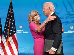 US President-elect Joe Biden arrives with wife Jill Biden to deliver remarks on the Electoral college certification at the Queen Theatre in Wilmington, Delaware on December 14, 2020. ROBERTO SCHMIDT / AFP