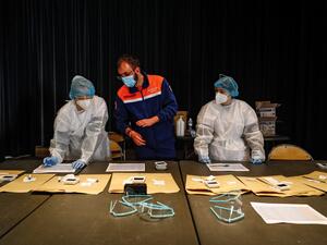 Medical staff work on realizing the test results at an operation centre for a Covid-19 mass testing campaign in Le Havre on December 15, 2020. Sameer Al-DOUMY / AFP