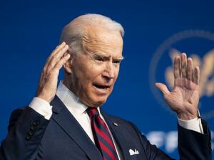 US President-elect Joe Biden speaks during an event to introduce key Cabinet nominees and members of his climate team at The Queen Theater in Wilmington, Delaware on December 19, 2020. ALEX EDELMAN / AFP