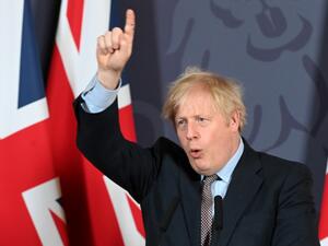 Britain's Prime Minister Boris Johnson gestures as he holds a remote press conference to update the nation on the post-Brexit trade agreement, inside 10 Downing Street in central London on December 24, 2020. Britain said on Thursday, December 24, 2020 an agreement had been secured on the country's future relationship with the European Union, after last-gasp talks just days before a cliff-edge deadline. Paul GROVER / POOL / AFP