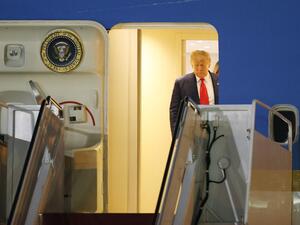 President Donald Trump prepares to exit from Air Force One at the Palm Beach International Airport on December 23, 2020 in West Palm Beach, Florida. President Trump is scheduled to enjoy a 10-day holiday visit at his Mar-a-Lago resort during the last Christmas of his precedency. Joe Raedle/Getty Images/AFP JOE RAEDLE / GETTY IMAGES NORTH AMERICA / Getty Images via AFP