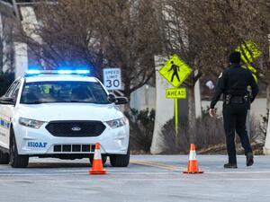 Police close off an area damaged by an explosion on Christmas morning on December 25, 2020 in Nashville, Tennessee. A Hazardous Devices Unit was en route to check on a recreational vehicle which then exploded, extensively damaging some nearby buildings. According to reports, the police believe the explosion to be intentional, with at least 3 injured and human remains found in the vicinity of the explosion. Terry Wyatt/Getty Images/AFP