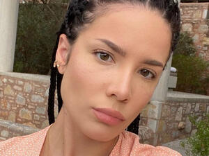 The 26-year-old singer wrote 'ask me to post a picture of' with a blank caption