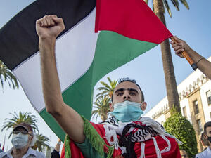 Moroccans wave the Palestinian flag during a demonstration against Israel-UAE-Bahrain normalization agreements in the capital Rabat, September 18, 2020. (Fadel Senna/AFP)