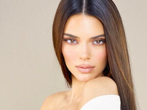Her bathroom is filled with neutral tones and lots of natural light