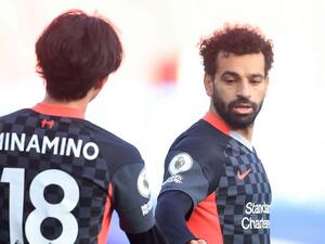 صلاح ومينامينو خلال لقاء ليفربول وكريستال بالاس