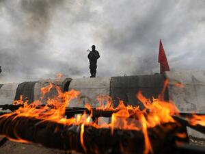 Turkey-backed Syrian fighters stand guard during military training at a base near the village of Al-Maabatli in the Afrin region in the northwestern Aleppo province countryside, on January 2, 2021. Bakr ALKASEM / AFP
