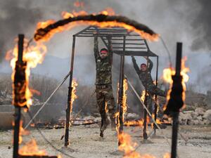 Turkey-backed Syrian fighters take part in military training at a base near the village of Al-Maabatli in the Afrin region in the northwestern Aleppo province countryside, on January 2, 2021. Bakr ALKASEM / AFP