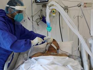 The lockdown, ordered after some hospitals started to run out of intensive care beds, includes a 24-hour curfew until January 25. ANWAR AMRO / AFP
